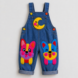 Lucky Sale-Children's overalls featuring a colorful smiley face, moon, and Corgi pattern.